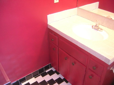 Red bathroom sink area